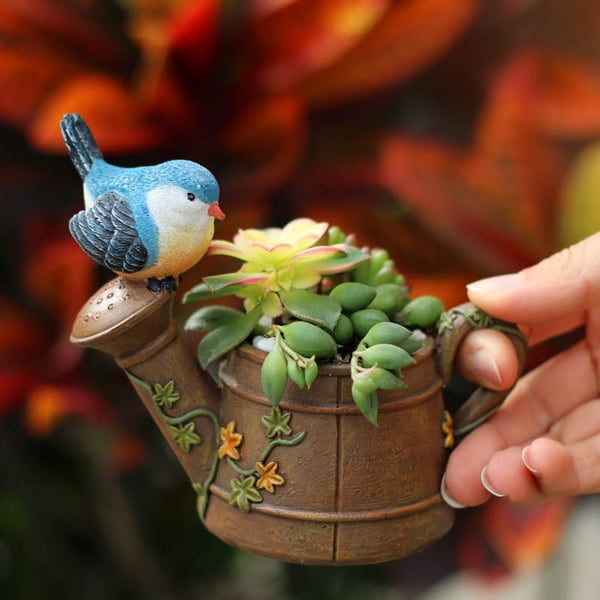 Bird planter with drainage system