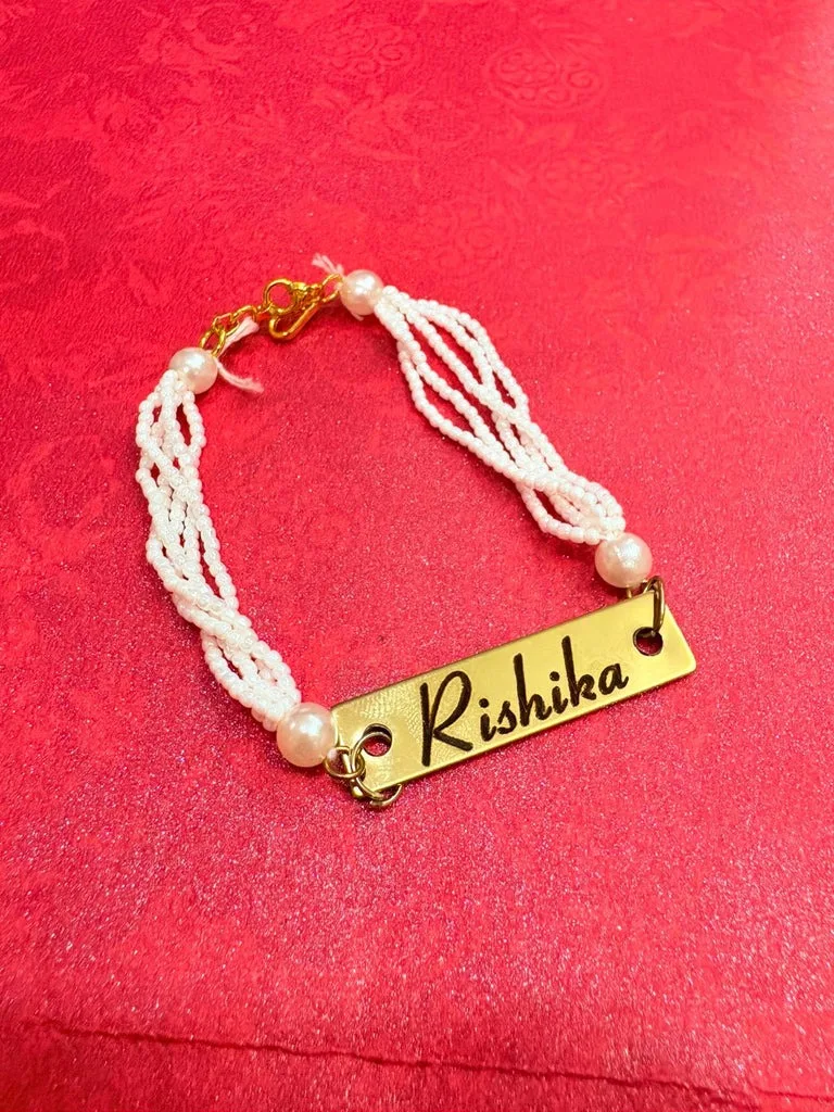 ✨ Rakhi Variant 83 – White Pearl Rakhi for Girls | Elegant Brass Finish thumbnail 1